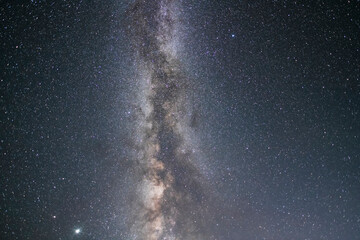 Beautiful starry sky with bright milky way galaxy. Night landscape. Astronomical background.  Night...