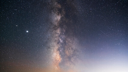 Beautiful starry sky with bright milky way galaxy. Night landscape. Astronomical background.  Night photography.
