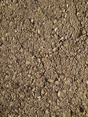 Wall of small stones with abstract masonry.