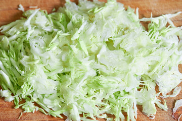 fresh sliced cabbage on a cooking board. domestic cooking. healthy lifestyles concept.