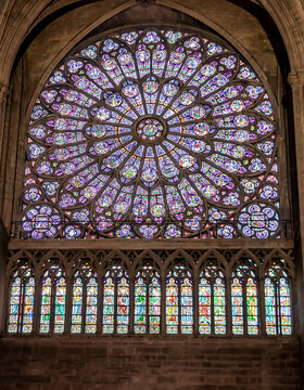 Paris, France - March 13, 2018: Stained glass window in Notre dame cathedral.  North Rose window at Notre Dame cathedral dates from 1250 and is also 12.9 meters in diameter. 