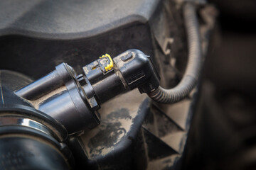 Engine with oil leaks. Old dusty motor close-up.