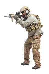 American soldier in military equipment with a rifle attacks on a white background, a commando with...