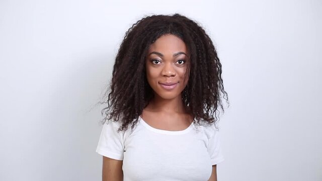 Portrait of a smiling African American young woman. Black beautiful happy girl.