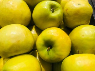 green apples in a market