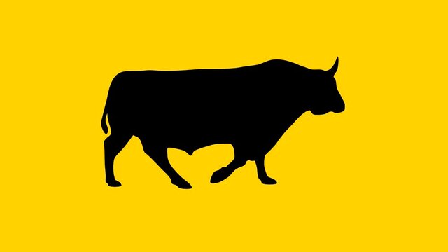 Silhouette of the walking bull, animation on the yellow background