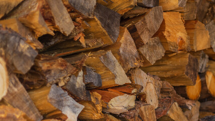Firewood logs cut and ready for winter at a rural Colorado ranch home near Denver