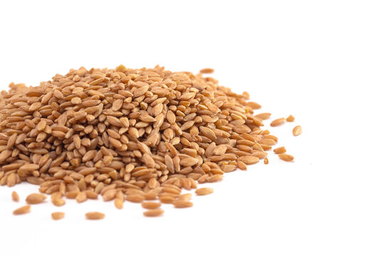Pile of Organic Einkorn Rice Isolated on a White Background