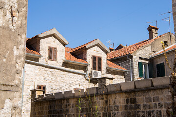 Fototapeta na wymiar Windows with shutters of an old house. Kotor. Montenegro.