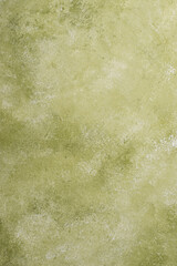 Concrete background in olive or khaki color