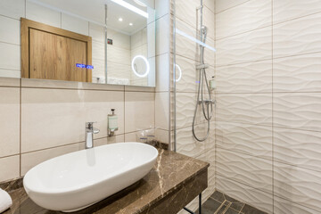 Interior of a hotel bathroom interior with shower cabin