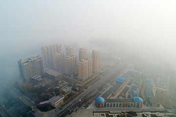 Urban buildings in haze