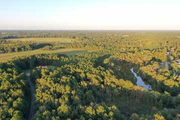 Aerial Drone View of partial lake and woods
