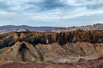 Red slag Racoș Volcano in Romania.