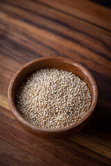 quinoa in wooden small bowl