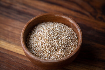 quinoa in wooden small bowl