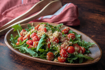 quinoa salad with tomato and arugula