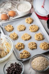 chocolate chip oatmeal cookie dough on iron pan