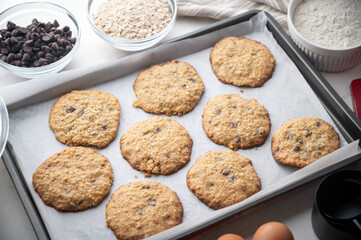 chocolate chip oatmeal cookie on iron pan