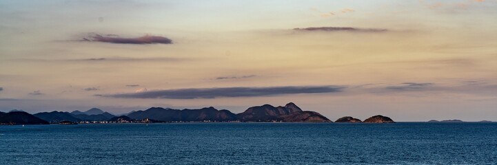 Beautiful view of the sea and the hills during sunset in Brazil