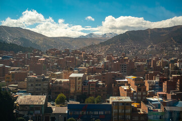 Urban Landscape seen from the Cable Car Line of the Andes Cordillera in La Paz / Bolivia