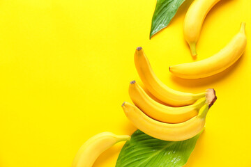 Ripe bananas on color background © Pixel-Shot