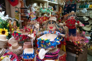 Handmade dolls and souvenirs in a street market in Brazil