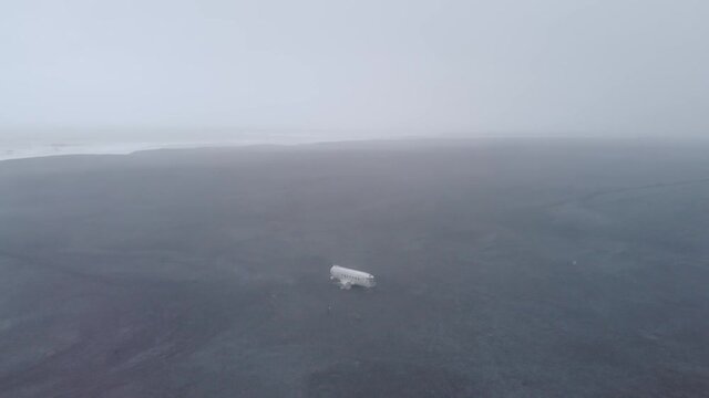 Iceland's DC-8 S&oacute;lheimasandur plane from an aerial view 4K near Black Sand Beach