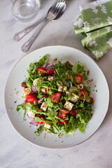 Strawberry and feta cheese salad. Healthy diet summer food. Overhead vertical image