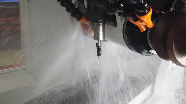 The machine for sharpening the cutting tool. Work with a strong supply of cutting fluid, a lot of spray.