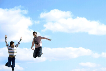 Fototapeta na wymiar Two men in the air