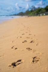 Fototapeta na wymiar footprints on the peaceful beach