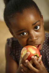 Girl eating apple