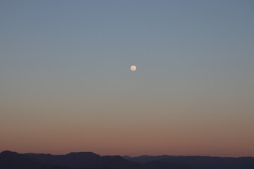 Moonrise and sunset.