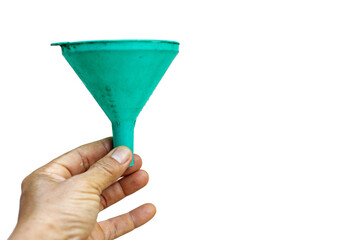 A hand holding a plastic cone