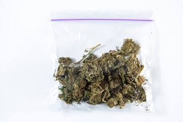 Dry marijuana in a plastic bag