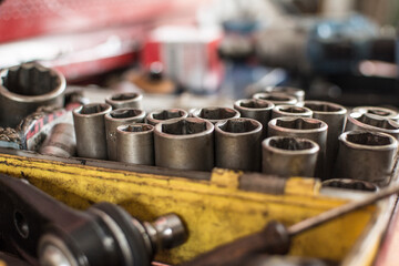 metallized background of socket wrench. perfect tool kit. Chrome Vanadium Steel. metallized fix equipment. socket wrench. King Mechanic. pro set of tools