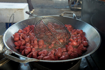 Deep fried mini sausage in boiling heat oil