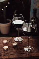  Red wine in two glasses, a romantic evening at home