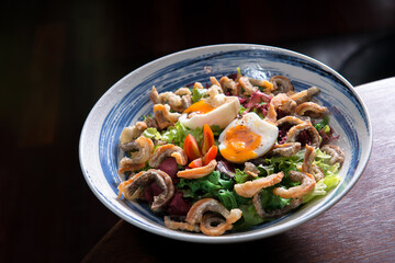 crispy salmon skin salad with boiled egg