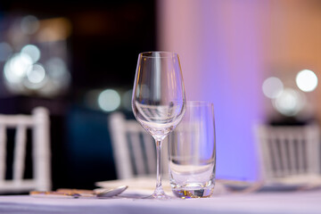 wine and water glasses on dining table