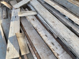 Obraz na płótnie Canvas pile of big brown wood plank