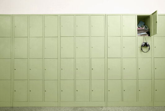 Headphones hanging out from locker