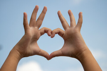 Two hands making heart symbol, Hands love sign