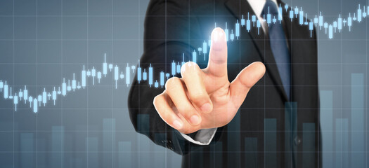 Obraz na płótnie Canvas Businessman plan graph growth and increase of chart positive indicators