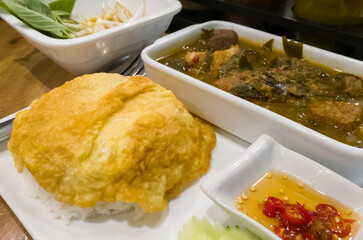 Omelet rice with curry