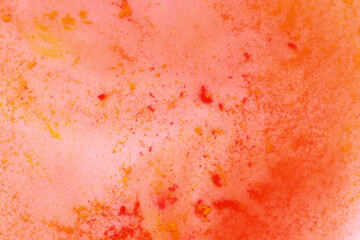 yellow and red paint in water