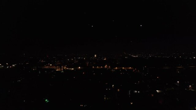 Aerial wide shot of illegal fireworks exploding over Paramount Studios in Los Angeles on 4th of July 2020. 4K