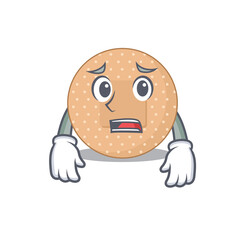 Cartoon image design rounded bandage showing worried face