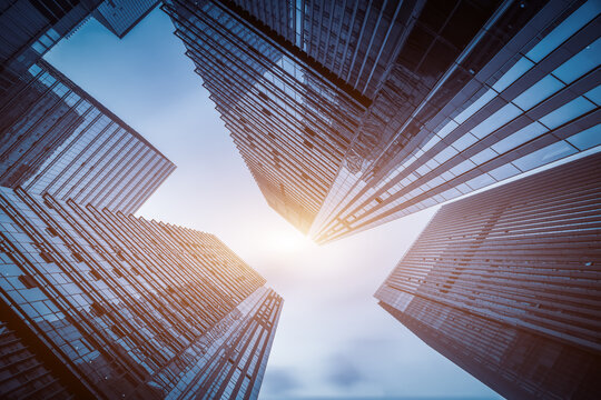 Fototapeta Modern tall buildings seen from below. Diminishing perspective